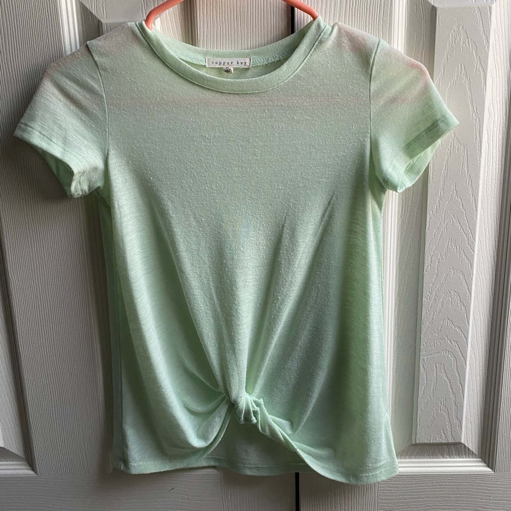 girls tied shirt